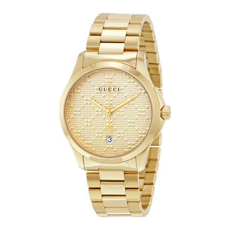 gucci watch gold detailing.